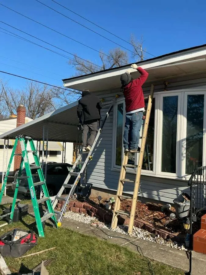 Restoration crew performing exterior repair in Milford